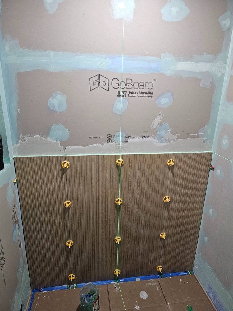 Shower wall tile progress with leveling system β Barrington IL