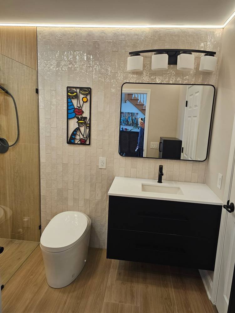 Finished bathroom with smart toilet, floating vanity and zellige tile β Barrington IL